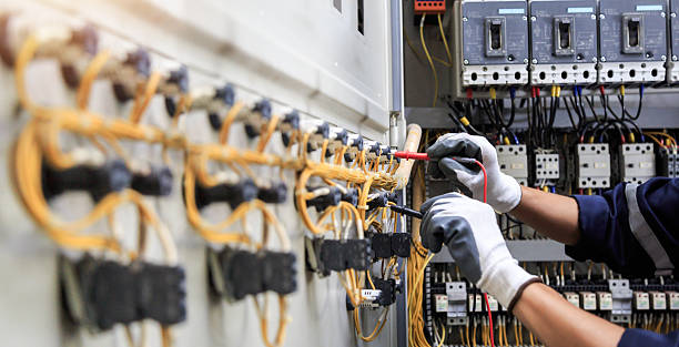 Professional Electrician technician working in Alma, AR